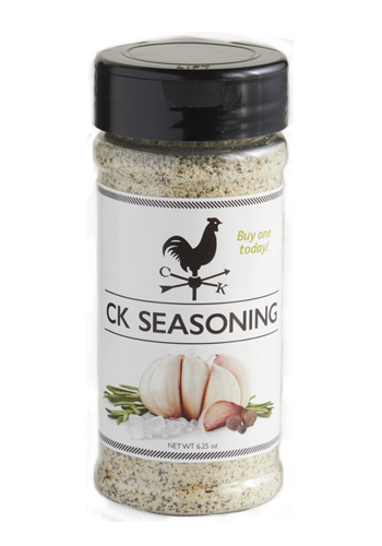 A bottle of CK Seasoning blend on a white background